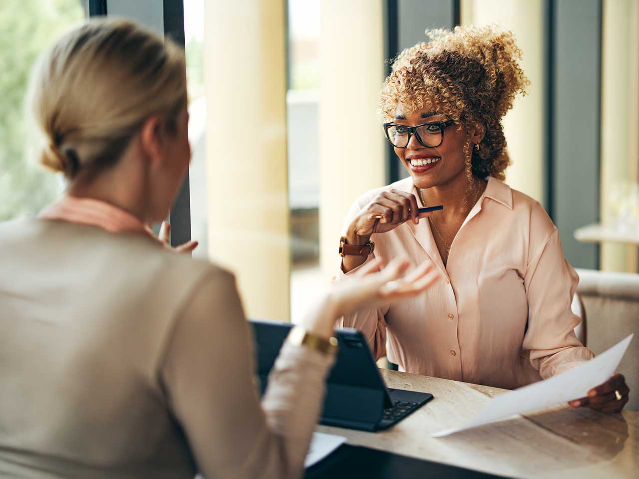 Client and advisor discussing frequently asked questions about financial planning