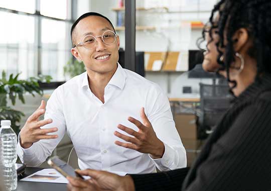 Beneficiary and advisor creating a market strategy and timeline