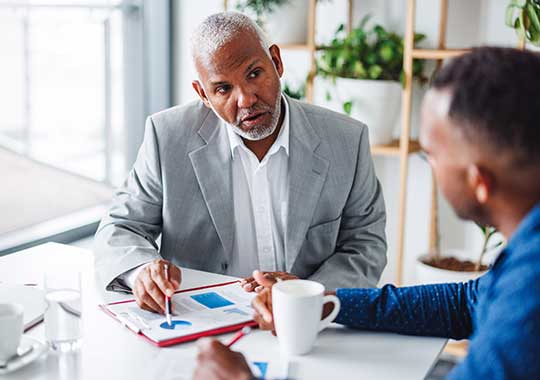 Advisor and client setting goals based on financial portfolio performance