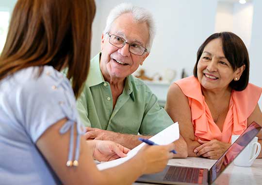 conversation-couple-discuss-retirement-wealth-advice