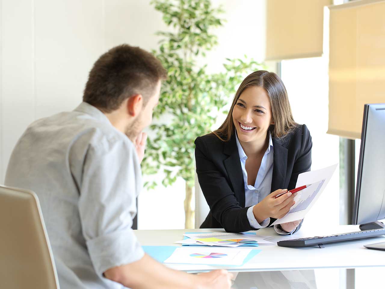 Advisor meeting with a client to discuss goals and next steps