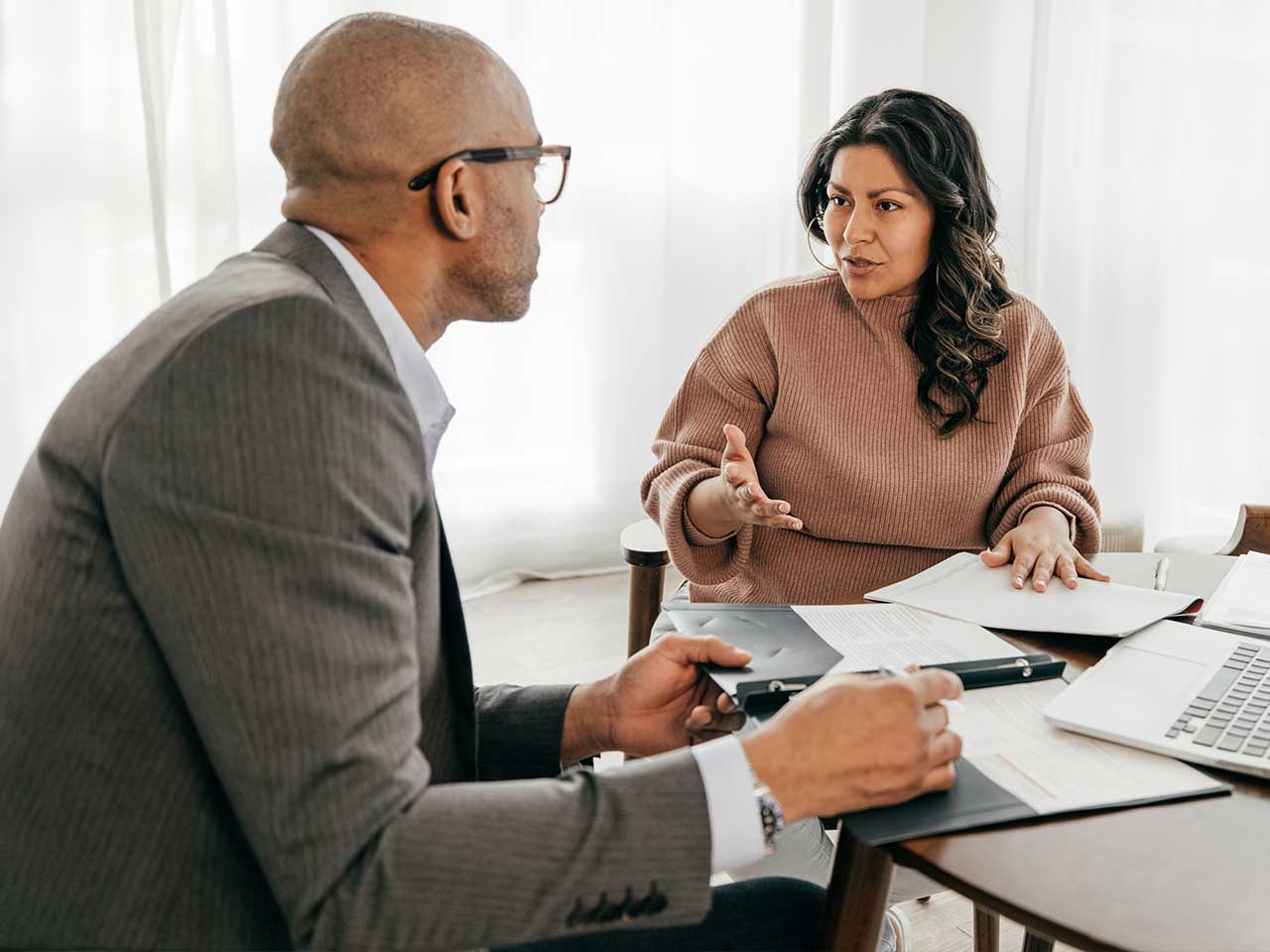 Financial advisor discussing 401(k) rollover options with a client
