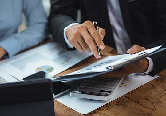 Client and advisor reviewing retirement checklist items